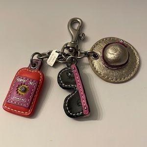 Coach pocketbook charm